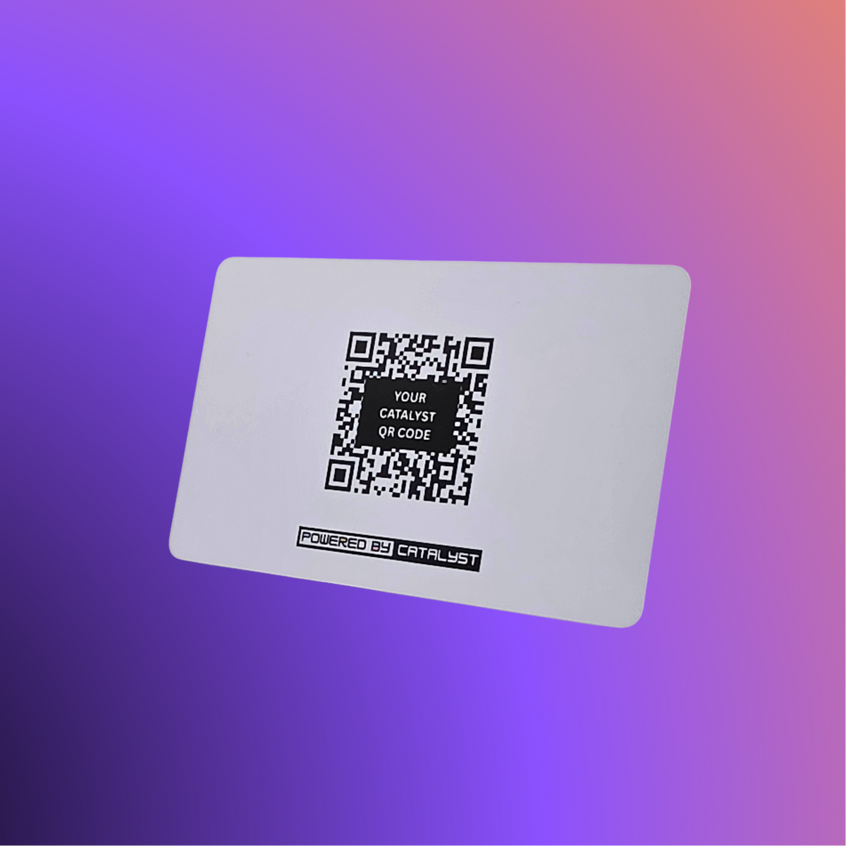 The Catalyst Card in matte white, back view, showing the QR code