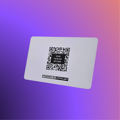 The Catalyst Card in matte white, back view, showing the QR code
